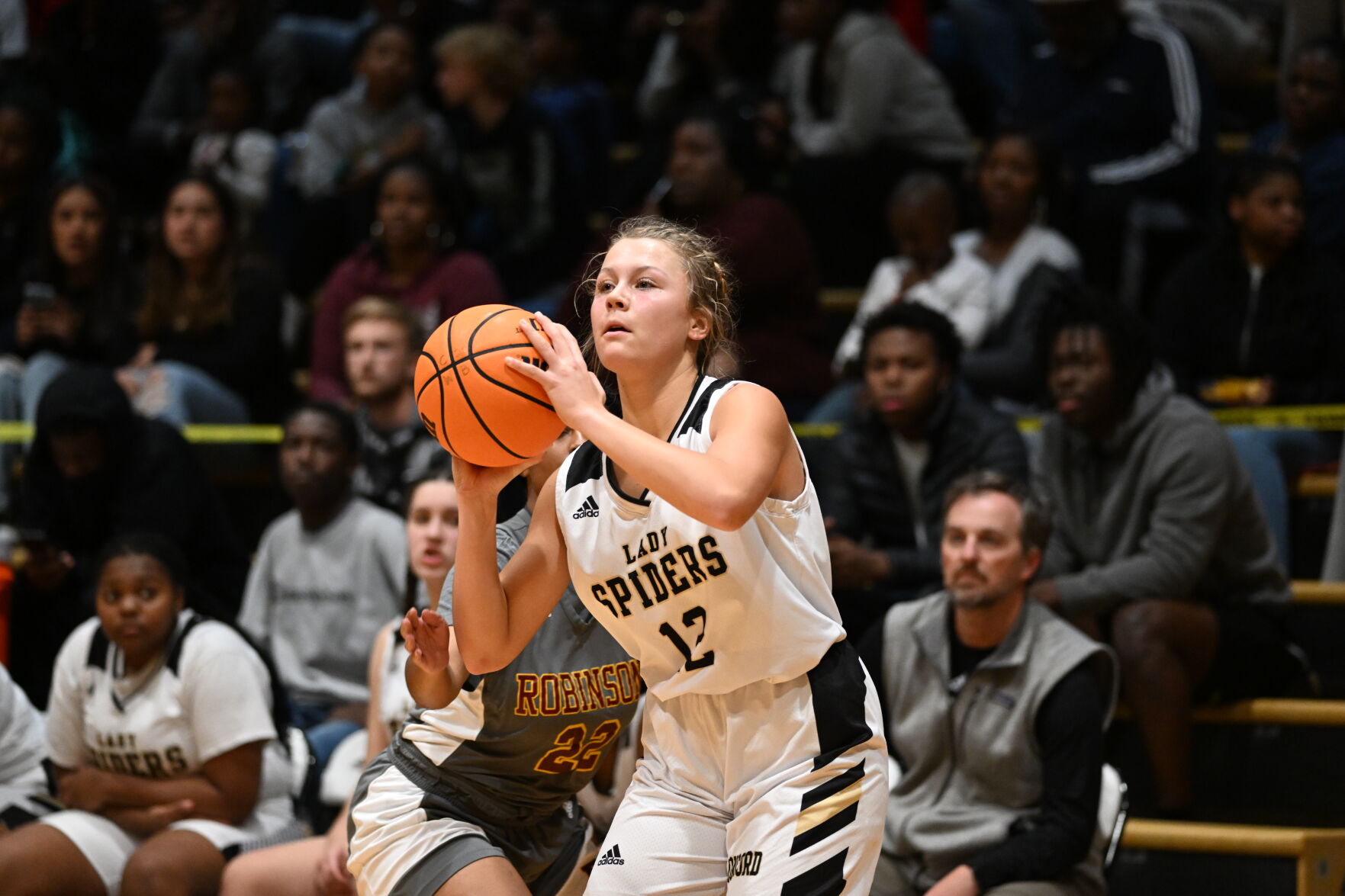 Robinson Rolls past the Spiders 71-25.